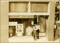 Portion of a postcard showing the front of Nelson's Pharmacy